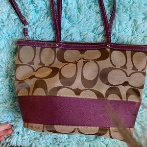 Coach purse with purple detailing